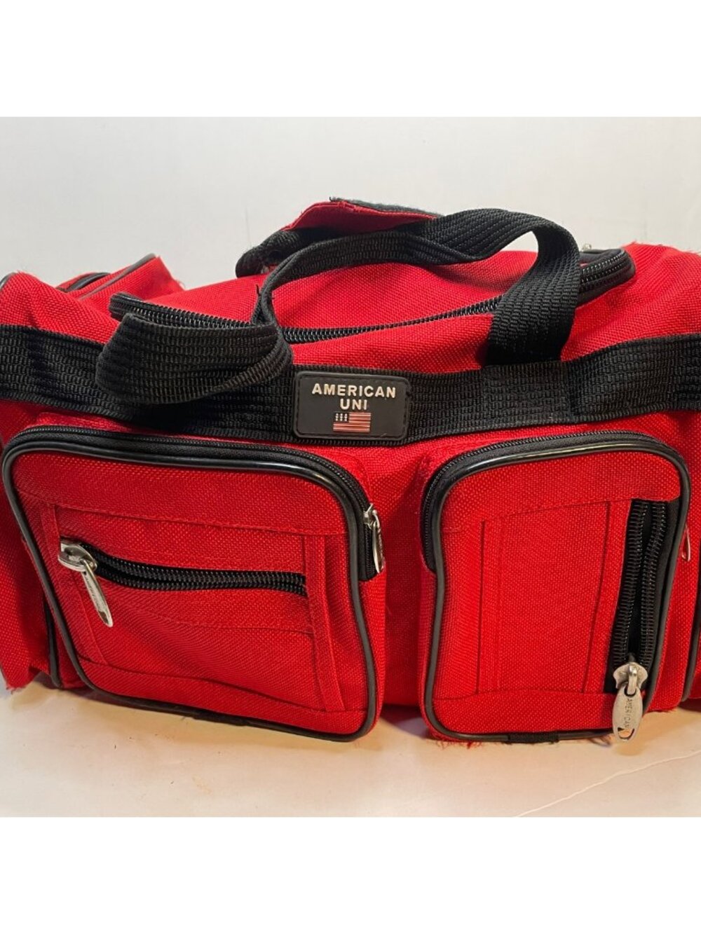 American Uni travel duffle bag 18" x 9" x 10" tall shoulder strap gym red black